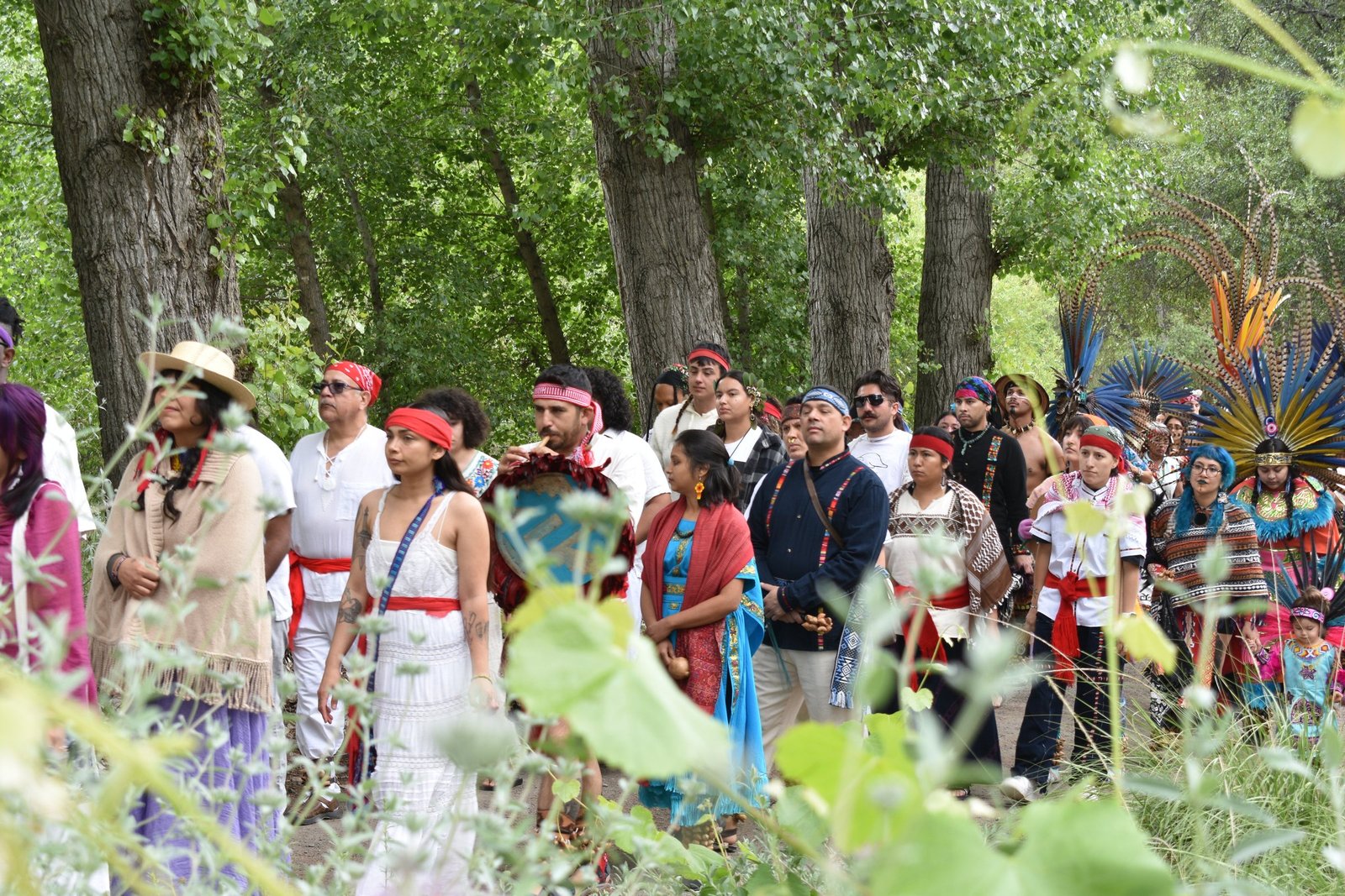 Apache Nation of Colorado community gathered during a procession.